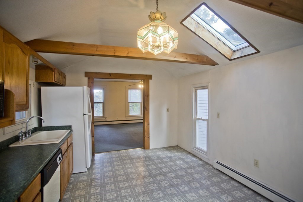 95 School Street Warren, MA 01083 - Photo 26 of 41 a view of a bathroom with a sink and a mirror