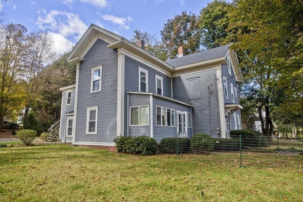 95 School Street Warren, MA 01083 - Photo 40 of 41 a front view of a house with a yard