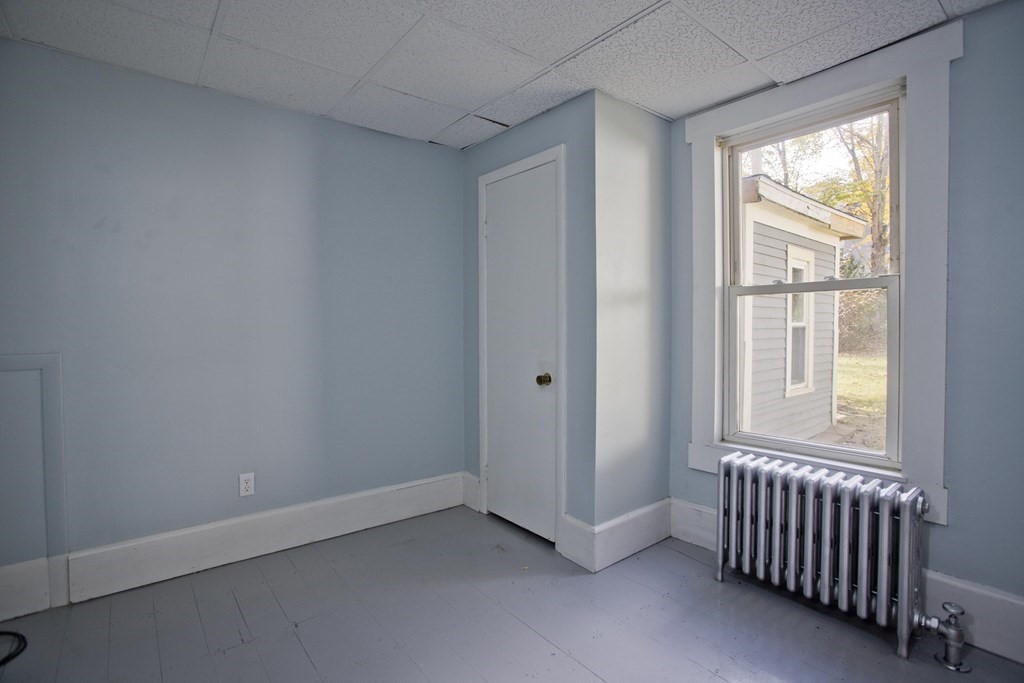 95 School Street Warren, MA 01083 - Photo 6 of 41 an empty room with windows