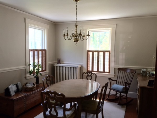 56 Curve Street Wellesley, MA 02482 - Photo 3 of 6 a view of a dining room with furniture window and outside view