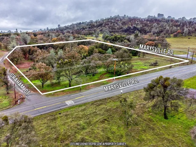 a view of a swimming pool with a lake view and mountain view