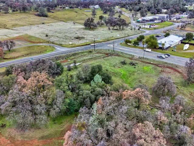 a view of a yard with an outdoor space