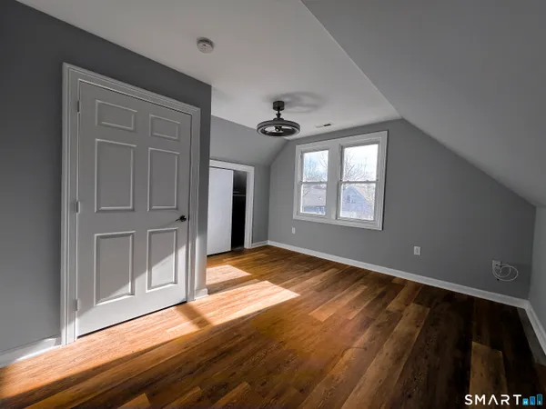 a view of an empty room and window