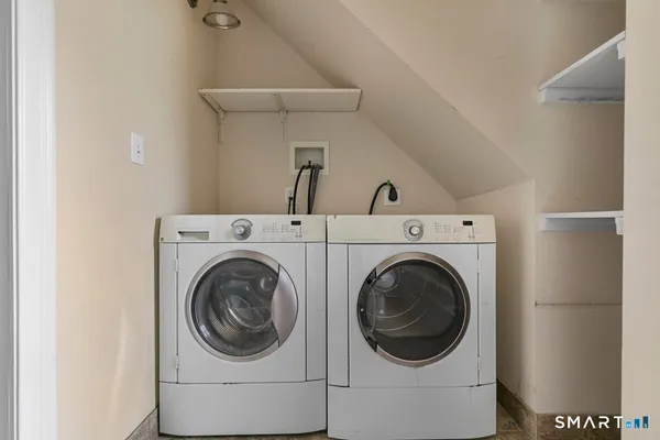 a utility room with dryer and washer