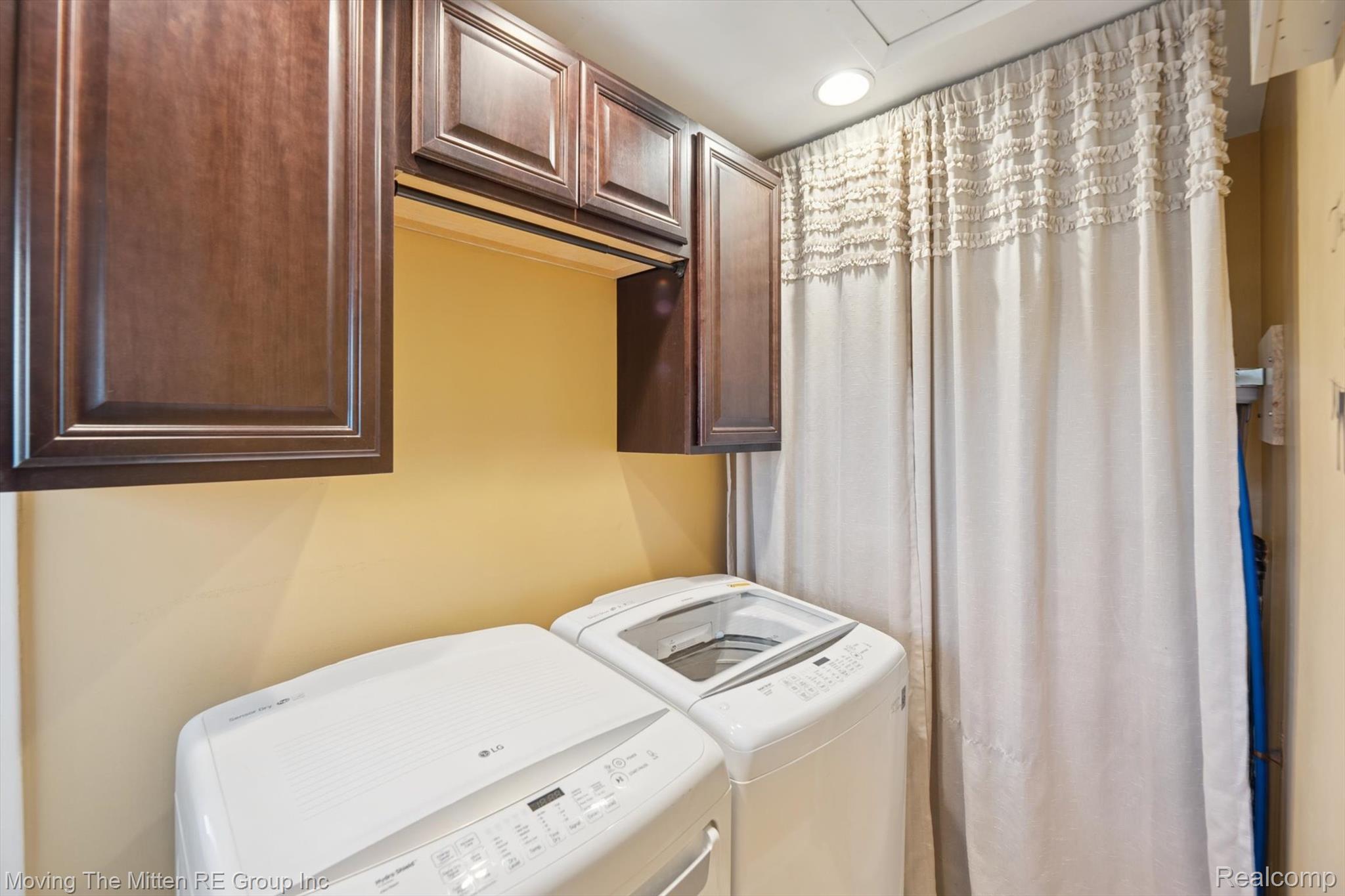 12000 Plank Road Milan, MI 48160 - Photo 29 of 49 Laundry area with separate washer and dryer and cabinet space
