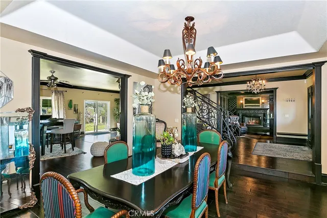 a view of a dining table and chairs in the patio