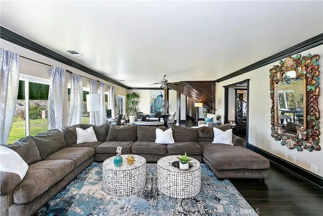 a bed room with a bed and a television