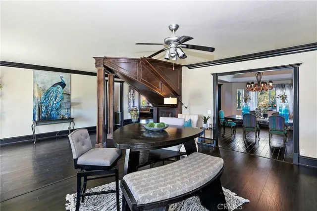 a bathroom with a sink toilet a mirror and shower curtain