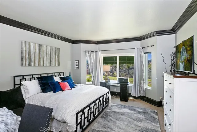 a view of a house with outdoor space and sitting area