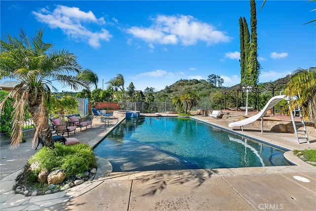 a view of swimming pool from a patio