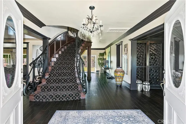 a living room with furniture windows and a fireplace
