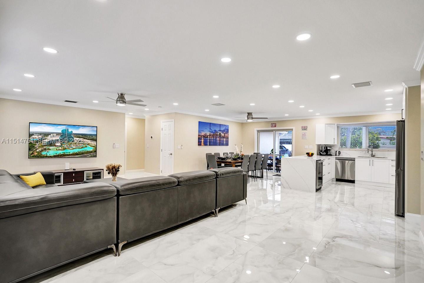 5500 Cleveland Street Hollywood, FL 33021 - Photo 17 of 45 a living room with furniture and a flat screen tv