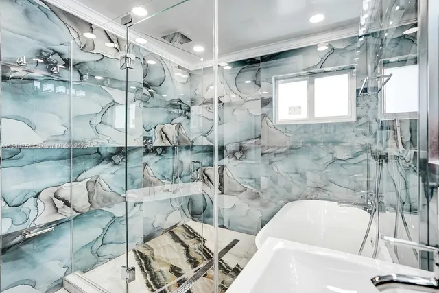 a bathroom with a sink and mirror