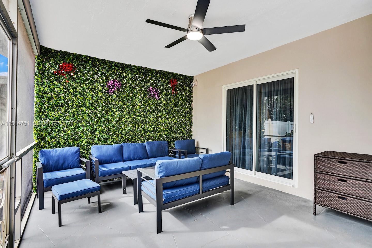 5500 Cleveland Street Hollywood, FL 33021 - Photo 8 of 45 a outdoor living space with furniture and a potted plant