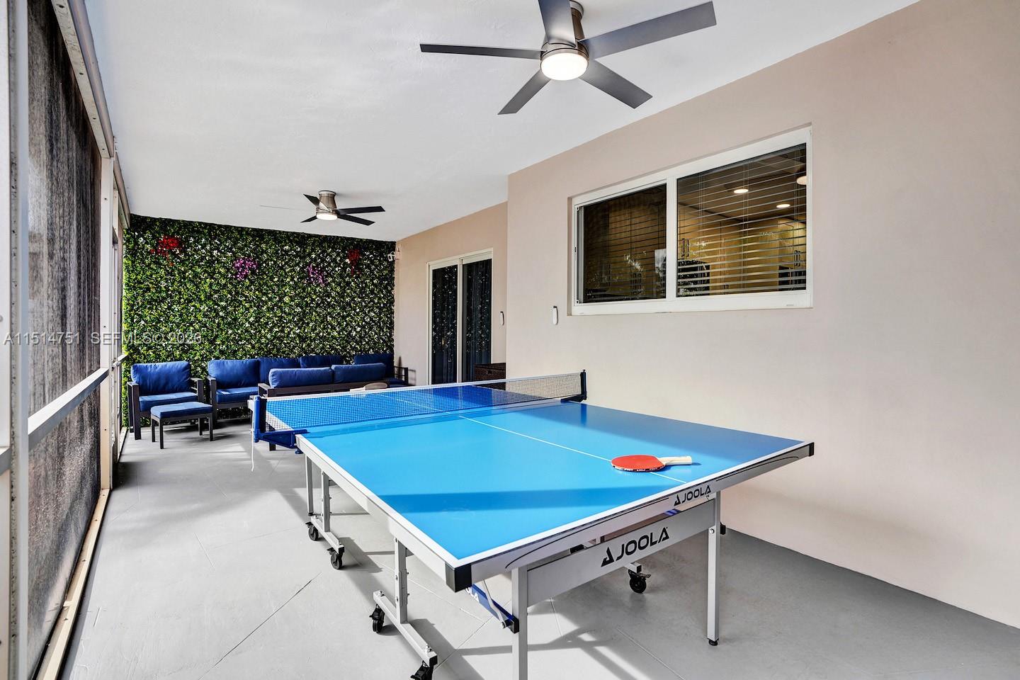 5500 Cleveland Street Hollywood, FL 33021 - Photo 9 of 45 a room with pool table and windows