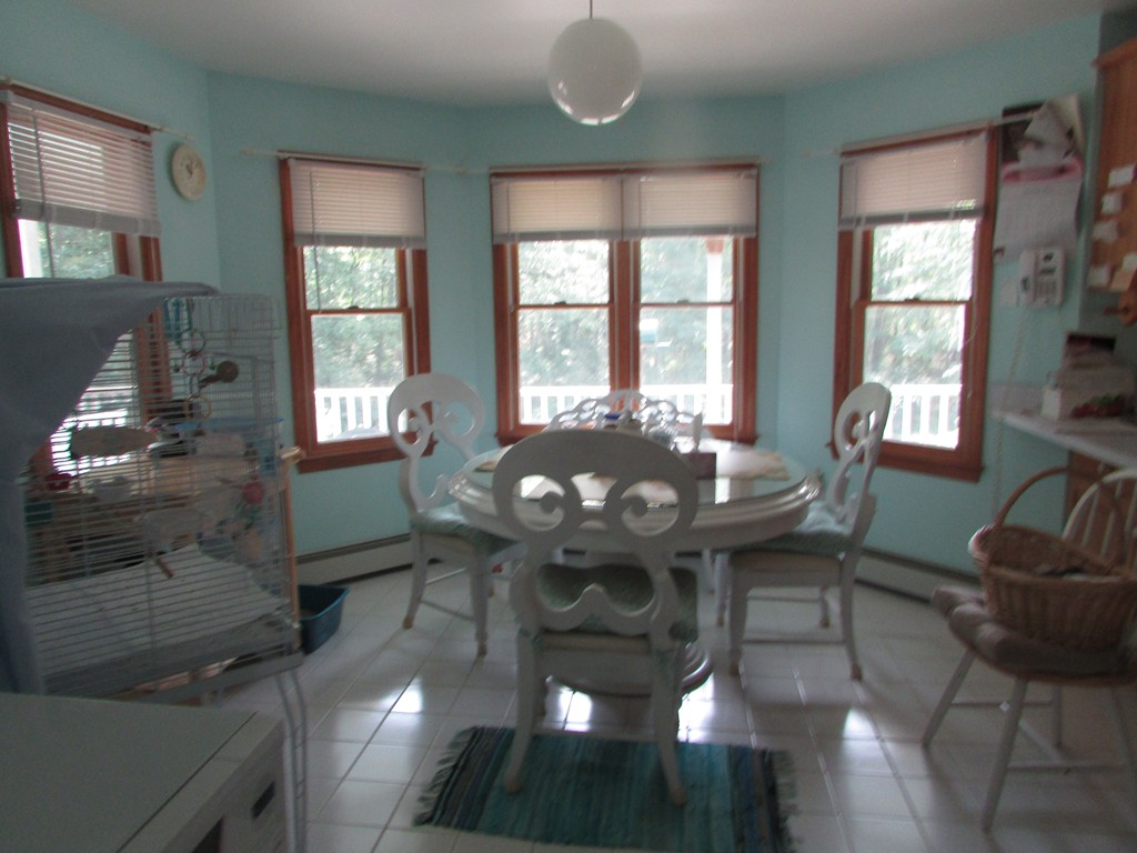 36 R Moody Byfield, MA 01922 - Photo 3 of 19 a view of a dining room with furniture window and outside view