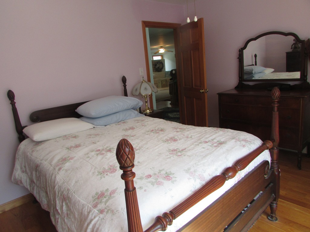 36 R Moody Byfield, MA 01922 - Photo 10 of 19 a bedroom with a bed and dresser