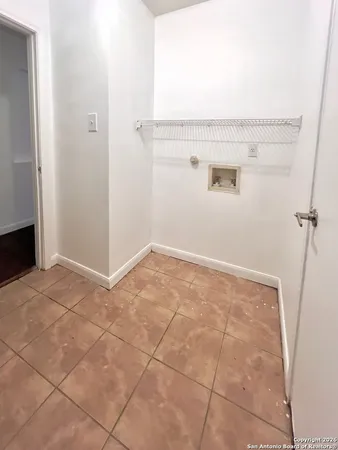 an empty room with a workbench