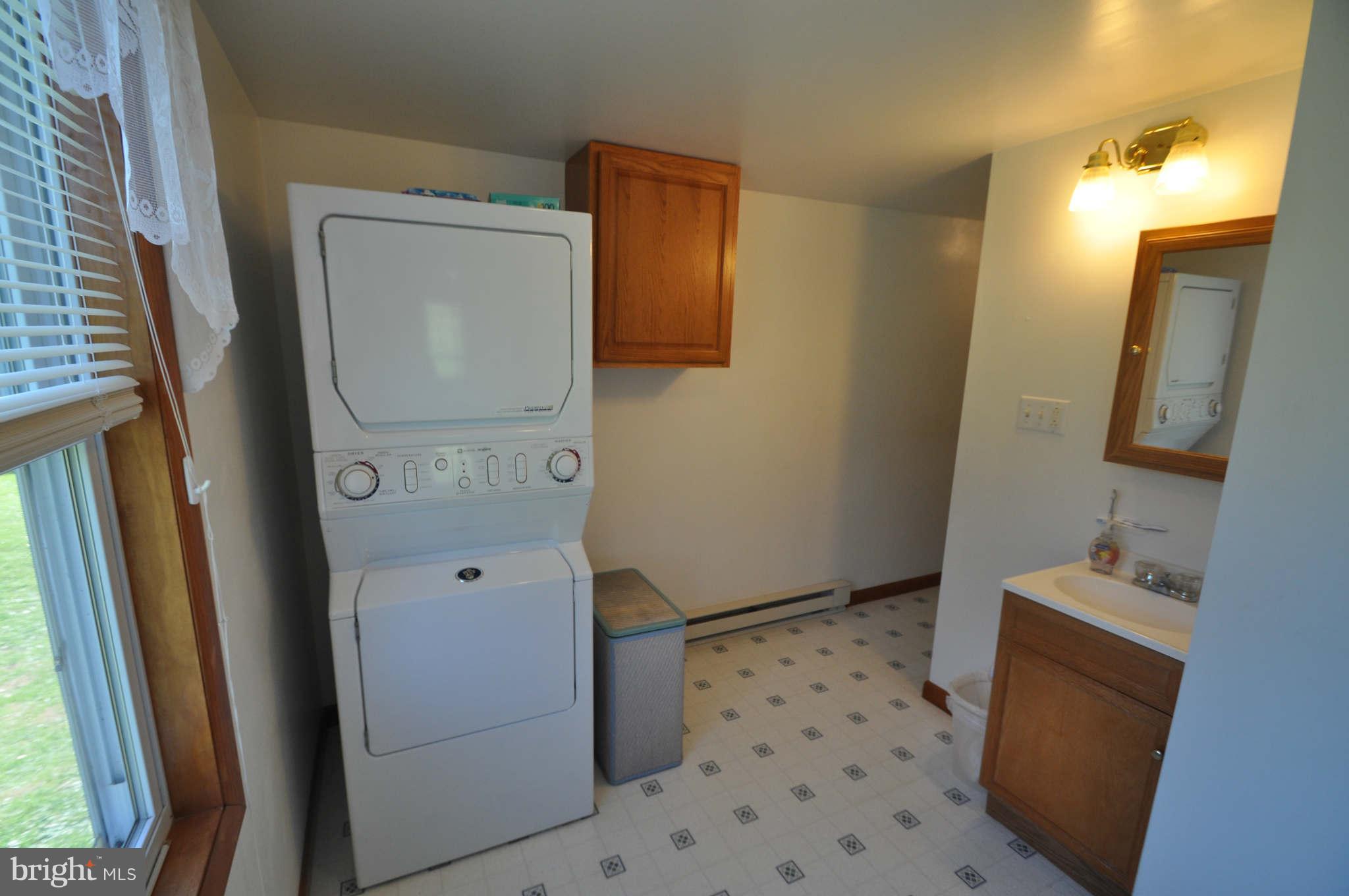213 North Clear Ridge Road Union Bridge, MD 21791 - Photo 12 of 17 LAUNDRY AND FULL BATH OFF KITCHEN