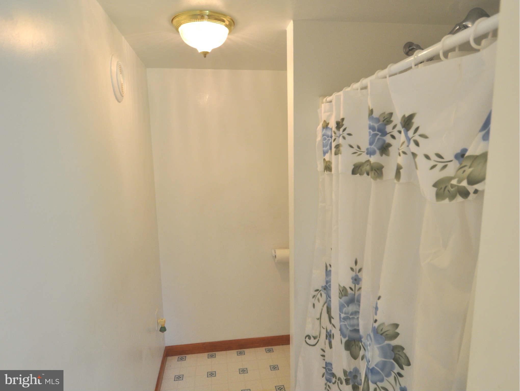 213 North Clear Ridge Road Union Bridge, MD 21791 - Photo 13 of 17 FULL BATH ON MAIN LEVEL OFF LAUNDRY FROM KITCHEN