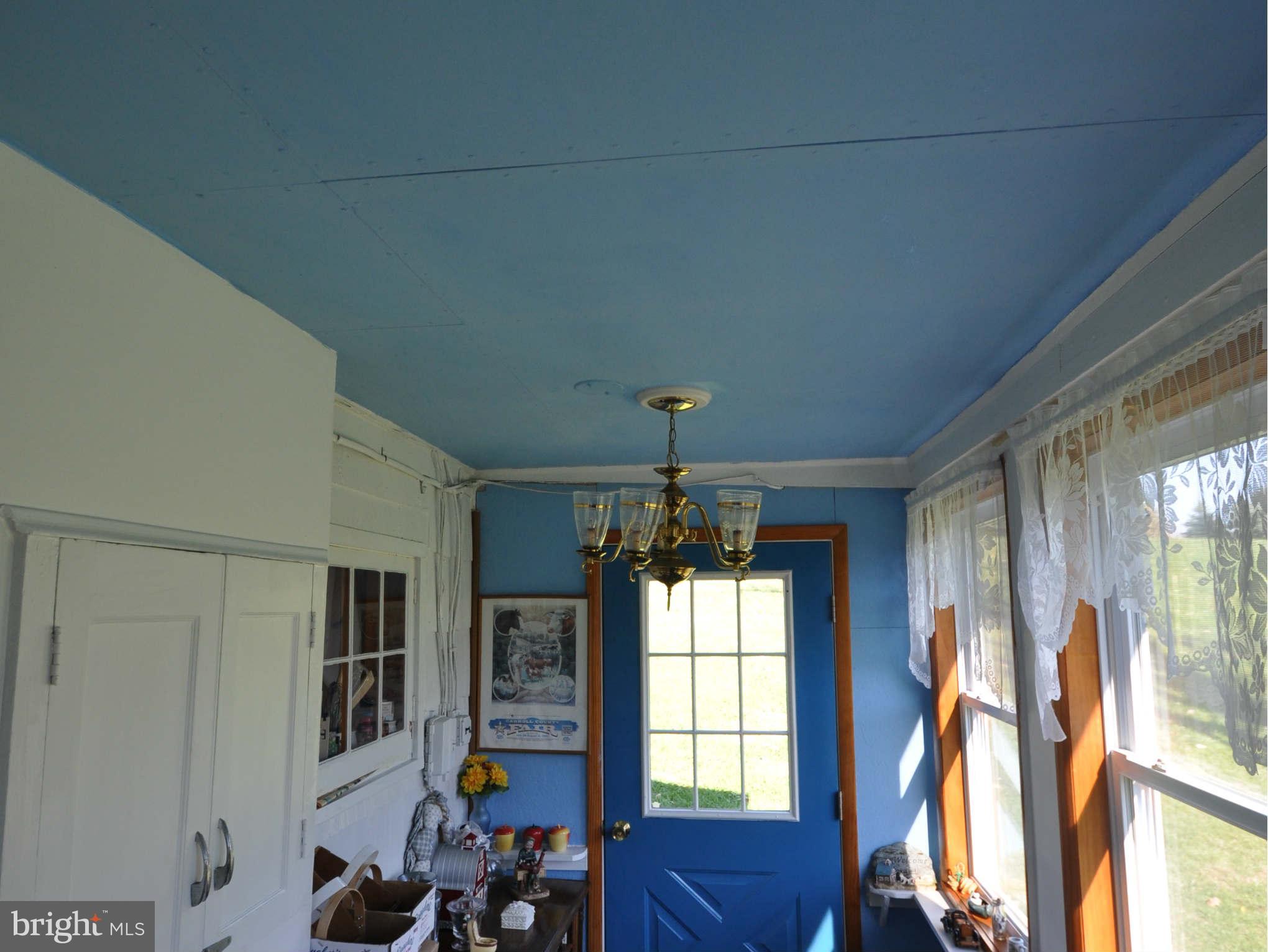 213 North Clear Ridge Road Union Bridge, MD 21791 - Photo 14 of 17 ENCLOSED BACK PORCH OFF KITCHEN