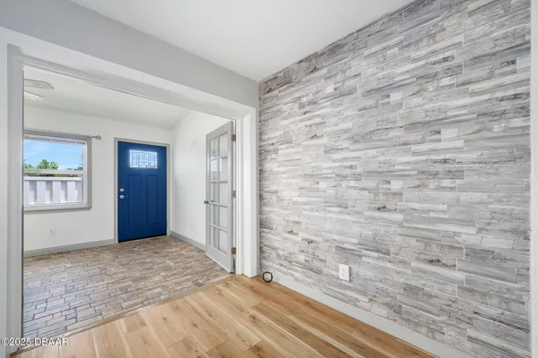 a view of an empty room and window
