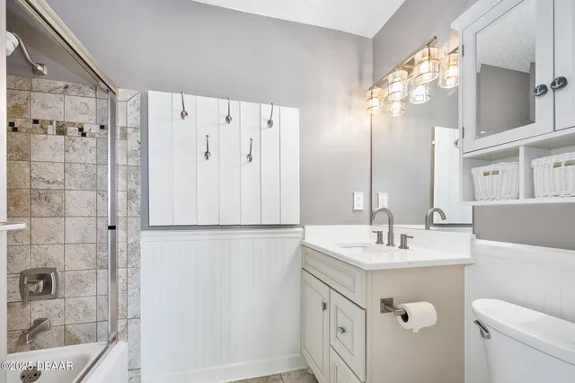 a bathroom with a sink double vanity and a mirror