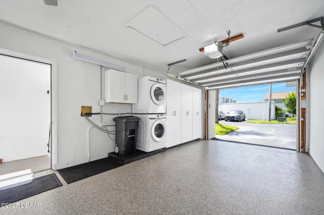 a view of a storage & utility room with washer and dryer