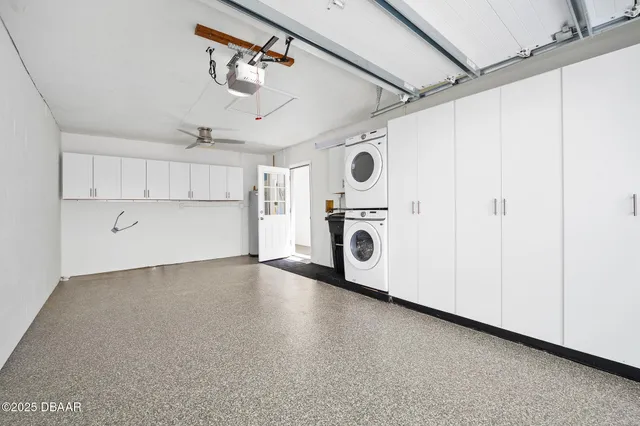 a view of a storage & utility room with washer and dryer