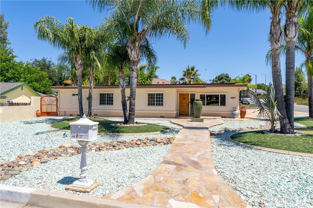front view of a house with a patio
