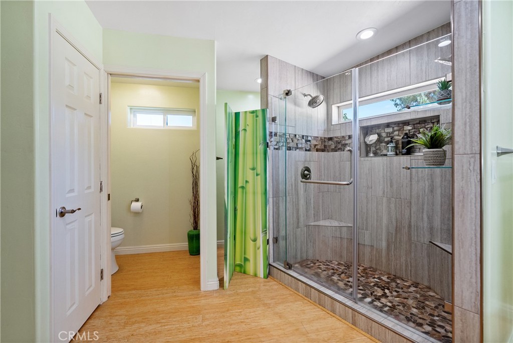 1002 Par Avenue Paso Robles, CA 93446 - Photo 16 of 59 a bathroom with a shower and a sink
