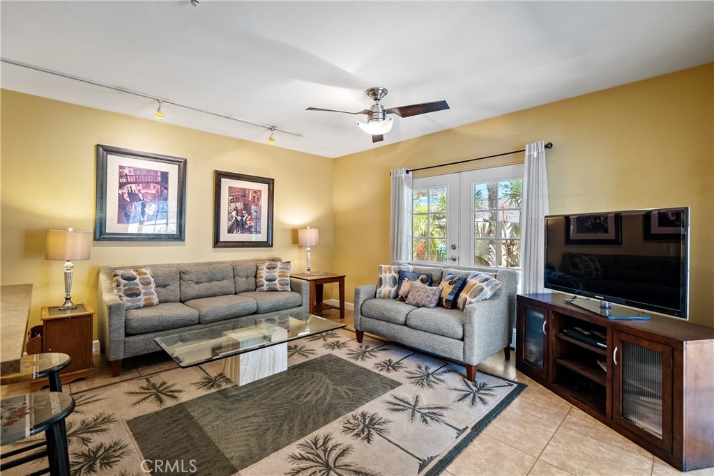 1002 Par Avenue Paso Robles, CA 93446 - Photo 28 of 59 a living room with furniture and a flat screen tv