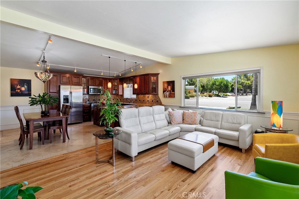 1002 Par Avenue Paso Robles, CA 93446 - Photo 4 of 59 a living room with furniture and a large window