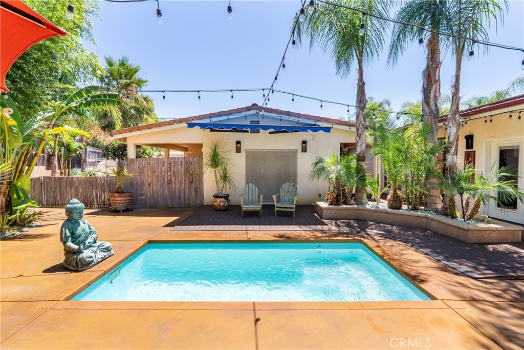 1002 Par Avenue Paso Robles, CA 93446 - Photo 43 of 59 a view of a backyard with plants and patio