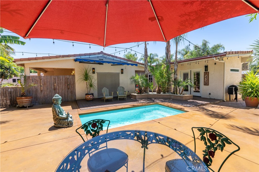 1002 Par Avenue Paso Robles, CA 93446 - Photo 47 of 59 a view of a swimming pool with a patio