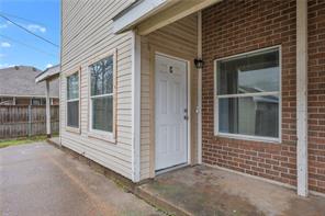 1104 Verde Drive, Unit D Bryan, TX 77801 - Photo 1 of 11 a view of wooden door and a window