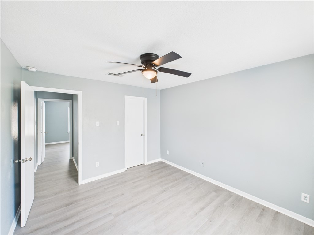 1104 Verde Drive, Unit D Bryan, TX 77801 - Photo 10 of 11 a view of empty room with wooden floor
