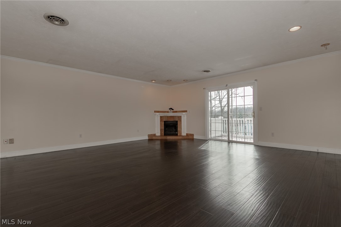 30200 Ridge Road Wickliffe, OH 44092 - Photo 26 of 43 Master Bedoom hardwood floors with fireplace