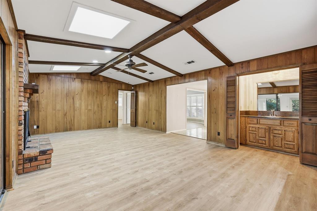 2505 Oak Manor Court Arlington, TX 76012 - Photo 7 of 23 a view of a hallway with wooden cabinet