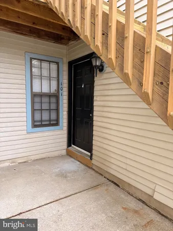 a view of a porch with a door