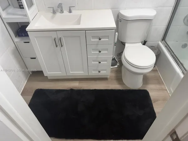 a bathroom with a sink and a toilet