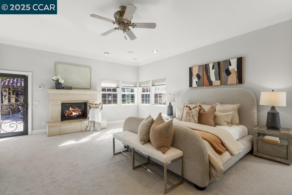 5655 Bruce Drive Livermore, CA 94551 - Photo 20 of 47 a spacious bedroom with a bed and a fireplace