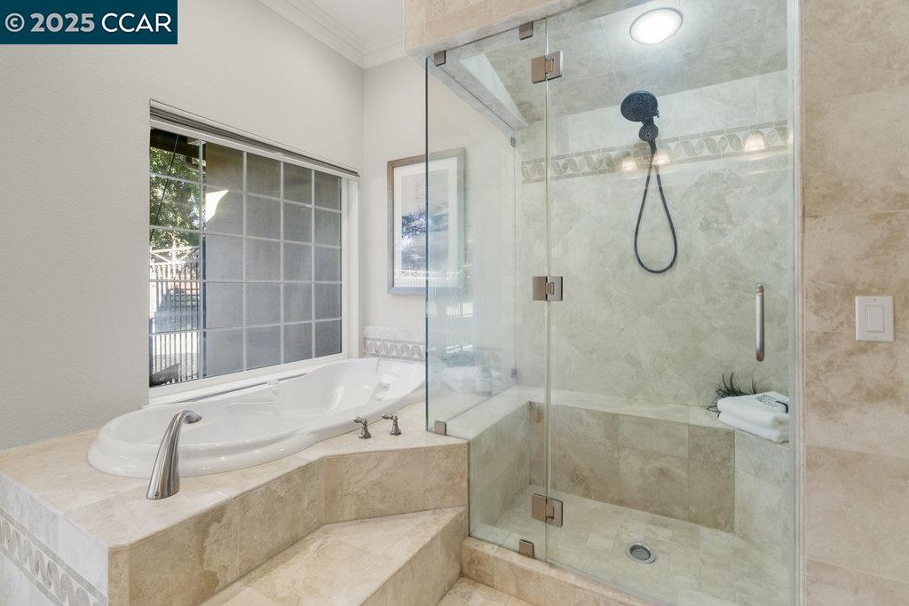 5655 Bruce Drive Livermore, CA 94551 - Photo 23 of 47 a bathroom with a tub and a shower