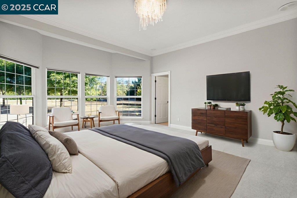 5655 Bruce Drive Livermore, CA 94551 - Photo 24 of 47 a bedroom with a bed and a flat screen tv