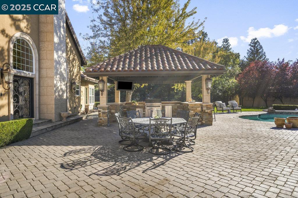 5655 Bruce Drive Livermore, CA 94551 - Photo 35 of 47 a view of a patio with a table chairs and a patio