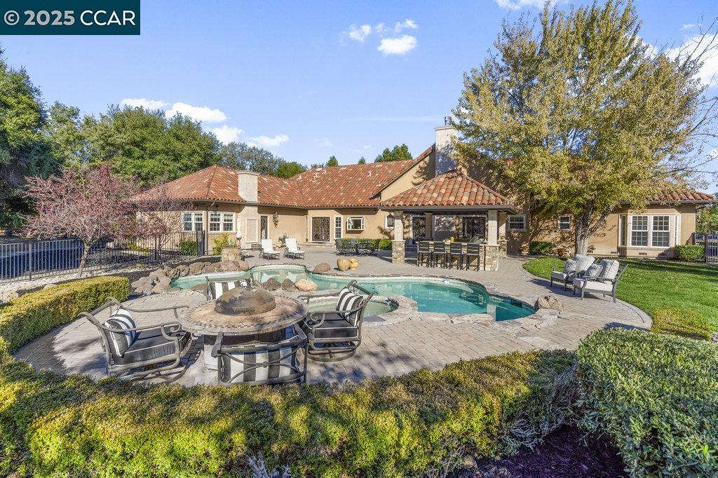 5655 Bruce Drive Livermore, CA 94551 - Photo 36 of 47 a view of a house with swimming pool and sitting area