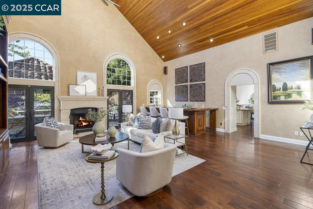 5655 Bruce Drive Livermore, CA 94551 - Photo 5 of 47 a living room with fireplace furniture and a large window