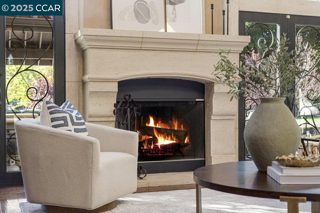 5655 Bruce Drive Livermore, CA 94551 - Photo 7 of 47 a living room with furniture a fireplace and a potted plant