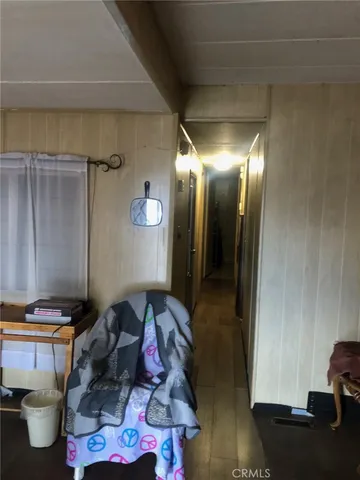 a bedroom with a bed and a table