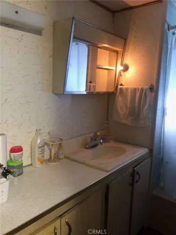 a view of kitchen and utility room